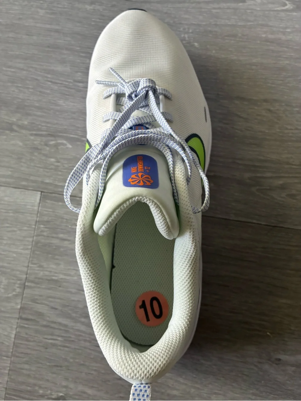 Nike Kids White Sneakers with Neon Lime Swoosh and Blue-White Laces